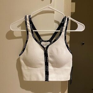 NWT Bebe workout Crop Top with zipper and logo